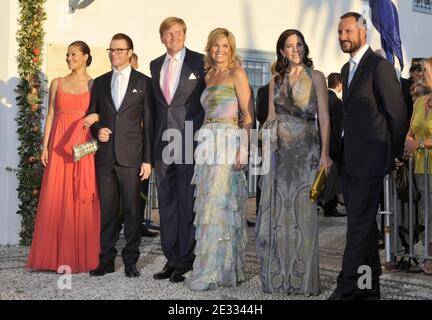 Crown Princess Victoria of Sweden, her husband Prince Daniel Westling, Crown Prince Willem-Alexander of the Netherlands, Crown Princess Maxima of the Netherlands, Crown Princess Mary of Denmark and Crown Prince Haakon of Norway attending the wedding of Prince Nikolaos of Greece and Tatiana Blatnik at the Orthodox Church of Ayios Nikolaos (Saint Nikolaos) on Spetses Island, Greece on August 25, 2010. Photo by Christophe Guibbaud/ABACAPRESS.COM Stock Photo