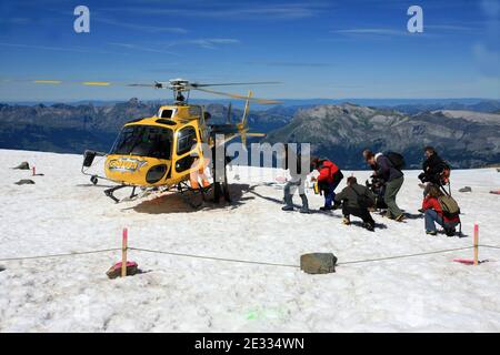 French engineers began an operation to remove 65,000 cubic meters of water underneath the Tete-Rousse glacier on Mont Blanc, in Saint-Gervais, southeastern France on August 25, 2010. The hidden lake threatens to flood the Saint-Gervais valley, a tourist destination and home to 3,000 people in the French Alps. The engineers are drilling a hole into the ice to pump out the water. In 1892, water from an underground lake flooded the same valley and killed 175 people. Photo by Daniel Giry/ABACAPRESS.COM. Stock Photo