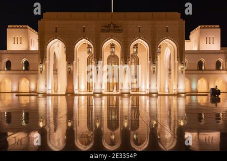 Middle East, Arabian Peninsula, Oman, Muscat. Night time view of the Royal Opera House. Stock Photo