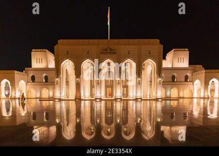 Middle East, Arabian Peninsula, Oman, Muscat. Night time view of the Royal Opera House. Stock Photo