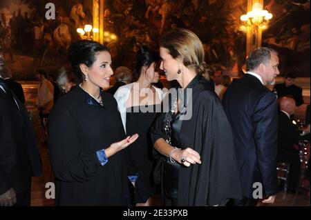 Qatar's Emir's daughter Sheikha Al Mayassa bint Hamad bin Khalifa Al-Thani, Chairperson of Qatar Museums Authority Board of Trustees, (L) talks with Marie-Laure de Villepin as they attend Japanese artist Takashi Murakami's exhibtion's opening party at Versailles Palace, near Paris, on September 12, 2010. Photo by Ammar Abd Rabbo/ABACAPRESS.COM Stock Photo