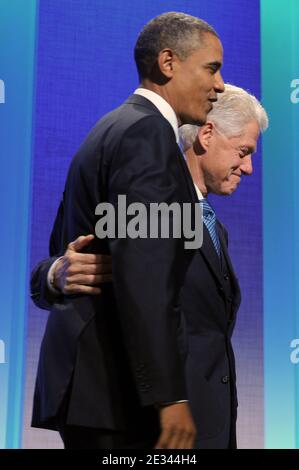 US President Barack Obama (front) is greeted by former US President Bill Clinton (back) at the Clinton Global Initiative (CGI) in New York City, NY, USA on September 23, 2010. President Obama joined sixty-four current and former heads of state in attending the sixth annual meeting of the CGI. The commitment of CGI members has improved the lives of more than 220 million people in 170 countries, according to President Bill Clinton. The 2010 meeting features a session on 'Peace and Beyond in the Middle East'. Photo by Michael Reynolds/EPA Pool/ABACAPRESS.COM Stock Photo