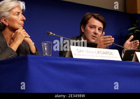 French Minister for the Economy, Finance and Employment Christine Lagarde and French Minister for the Budget, Public Finances and the Civil Service Francois Baroin present the France 2011 Budget during a press conference at the ministry of finance in Paris, France, on September 29, 2010. Photo by Stephane Lemouton/ABACAPRESS.COM Stock Photo