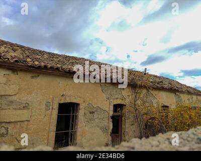 Closeup shot of an old house with a red rooftop Stock Photo