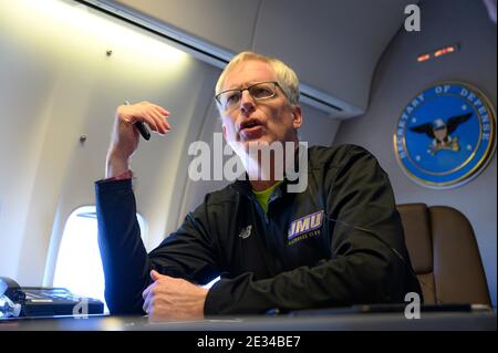 Washington, United States. 14th Jan, 2021. U.S. Acting Defense Secretary Chris Miller speaks to reporters on a government aircraft en route to Joint Base Andrews January 14, 2021 in flight. Credit: Planetpix/Alamy Live News Stock Photo