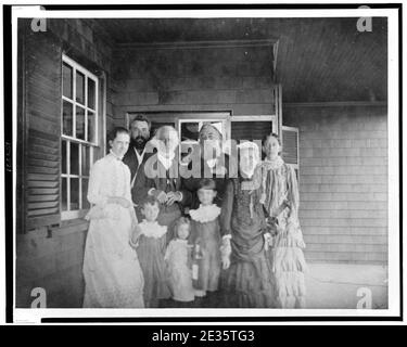 Mabel Hubbard Bell, Alexander Graham Bell, Dr. Bartol, Alexander Melville Bell, Eliza Grace Symonds, and Mary True with children, Daisy Bell, Gypsy Grossman, and Elsie Bell at the Hubbard Stock Photo