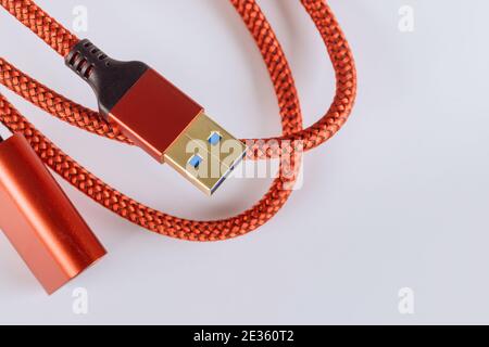 Extended red cable usb3.0 in isolated on white Stock Photo