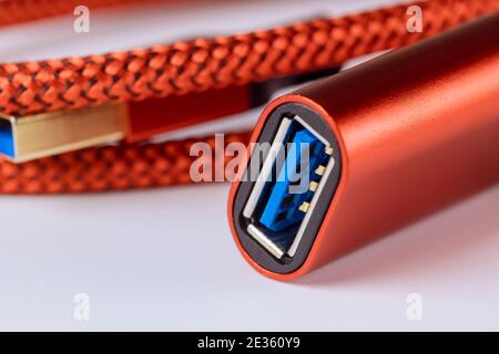 Female connector red cable USB3.0 on isolated white background Stock Photo