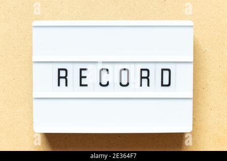 Lightbox with word record on wood background Stock Photo