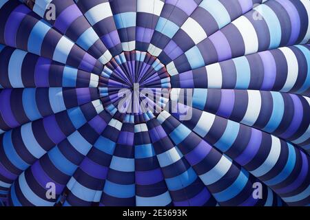 Looking down from above, to the crown of a wonderful hot air balloon. Close up Stock Photo