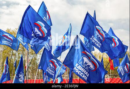 Samara, Russia - May 1, 2019: Flags of the party United Russia against the blue sky Stock Photo