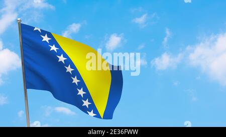 Bosnia and Herzegovina flag on pole. Blue sky. National flag of Bosnia and Herzegovina Stock Photo