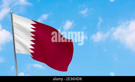 Qatar flag on pole. Blue sky. National flag of Qatar Stock Photo