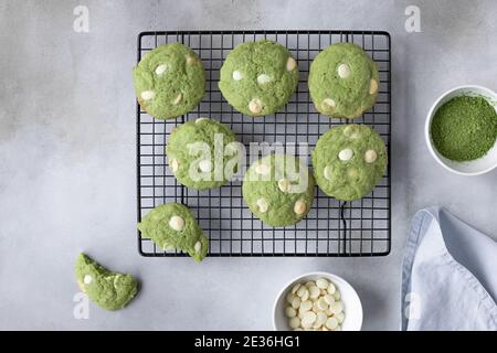 flat lay composition with green tea matcha cookies on cooling rack Stock Photo