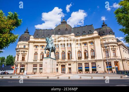 Bucharest, Romania. The Central University Library and statue of King Carol I of Romania. Stock Photo