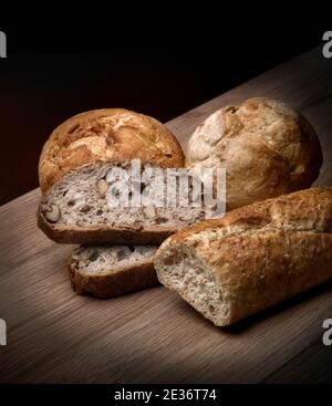 Still life of different kind of bakery on wood table Stock Photo