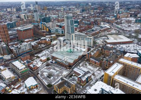Aerial photo of the town centre of Leeds in West Yorkshire, near the Bridgewater Place apartment building along side the Leeds Train Station in the sn Stock Photo