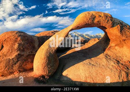 Mobius Arch, Lower 48, rock arch of eroded granite rock, sunrise, Alabama Hills, California, Lone Pine Peak, 12994, feet, Mt. Whitney, 14497, highest Stock Photo