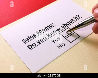 One person is answering question about sales memo. Stock Photo