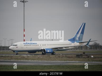 17 January 2021, Brandenburg, Schönefeld: The plane of the airline 'Pobeda' in which Kremlin opponent Navalny and his wife want to fly back to Moscow arrives at the airport. Navalny stayed in Germany for almost five months for treatment following his poisoning. The 44-year-old is considered the most prominent opponent of Russian President Putin. Navalny wants to continue his political fight against Putin. Photo: Michael Kappeler/dpa Stock Photo