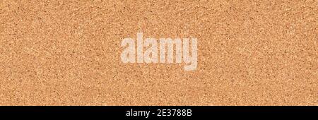 empty corkboard or pinboard or bulletin board cork background in wide banner or header format Stock Photo