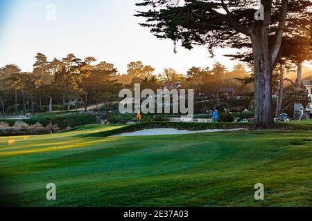 Pebble Beach, California, February 17, 2018:  The famous 18th hole at the Pebble Beach golf links offers assorted seaview vistas in addition to challe Stock Photo