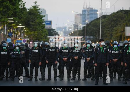 Bangkok, Thailand. 16th Jan, 2021. Riot Police stand guard during a pro-democracy demonstration to demand the release of the arrested activists.Pro-democracy protesters took the streets around Samyan Shopping Mall demanding the resignation of Thailand Prime Minister and the reform of the monarchy. The protesters denounced the use of the ‘Lese Majeste law' under the section 112 of the penal code and asked the autorities to release the activists who has been arrested under that same law. Credit: SOPA Images Limited/Alamy Live News Stock Photo