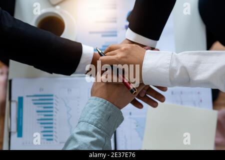 harmonious and team concept,close up hand of office colleague put together Stock Photo