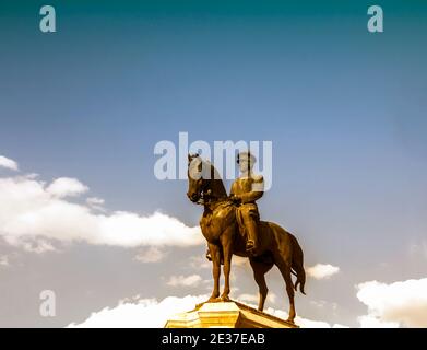 The statue of Ataturk and national flags of modern Turkey in Ulus - Ankara, Turkey Stock Photo