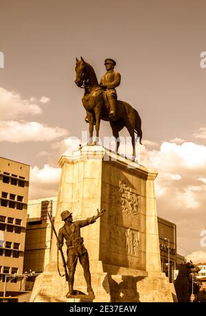 The statue of Ataturk and national flags of modern Turkey in Ulus - Ankara, Turkey Stock Photo