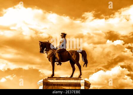 The statue of Ataturk and national flags of modern Turkey in Ulus - Ankara, Turkey Stock Photo