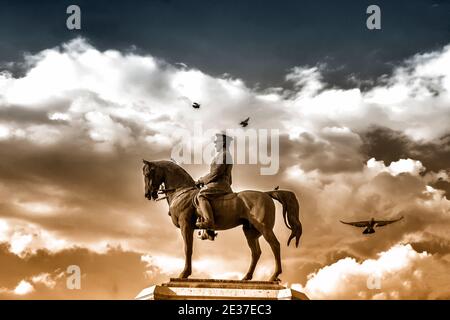 The statue of Ataturk and national flags of modern Turkey in Ulus - Ankara, Turkey Stock Photo