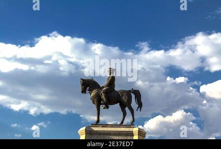 The statue of Ataturk and national flags of modern Turkey in Ulus - Ankara, Turkey Stock Photo