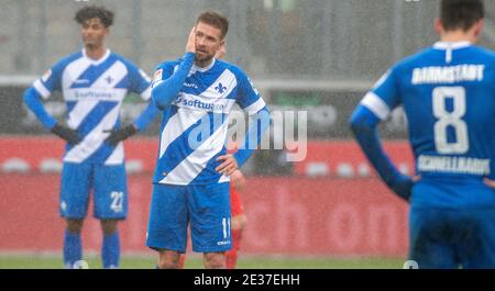 Heidenheim, Germany. 17th Jan, 2021. Football: 2. Bundesliga, 1. FC Heidenheim - Darmstadt 98, Matchday 16 at Voith Arena. Tobias Kempe (r) and Aaron Seydel of Darmstadt are disappointed. Credit: Stefan Puchner/dpa - IMPORTANT NOTE: In accordance with the regulations of the DFL Deutsche Fußball Liga and/or the DFB Deutscher Fußball-Bund, it is prohibited to use or have used photographs taken in the stadium and/or of the match in the form of sequence pictures and/or video-like photo series./dpa/Alamy Live News