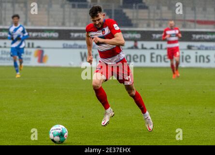 Heidenheim, Germany. 17th Jan, 2021. Football: 2. Bundesliga, 1. FC Heidenheim - Darmstadt 98, Matchday 16 at Voith Arena. Heidenheim's Denis Thomalla plays the ball. Credit: Stefan Puchner/dpa - IMPORTANT NOTE: In accordance with the regulations of the DFL Deutsche Fußball Liga and/or the DFB Deutscher Fußball-Bund, it is prohibited to use or have used photographs taken in the stadium and/or of the match in the form of sequence pictures and/or video-like photo series./dpa/Alamy Live News