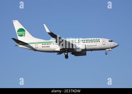 German Germania Boeing 737-700 with registration D-AGEQ on short final for runway 05R of Dusseldorf Airport. Stock Photo