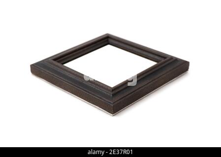 Vintage dark brown wooden photo frame isolated on white background Stock Photo
