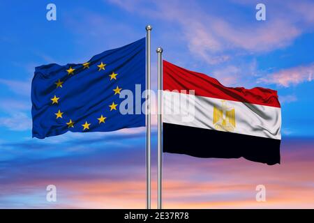 Double Flag European Union vs Egypt waving flag with texture floating in the sky - 3D illustration - 3D render Stock Photo