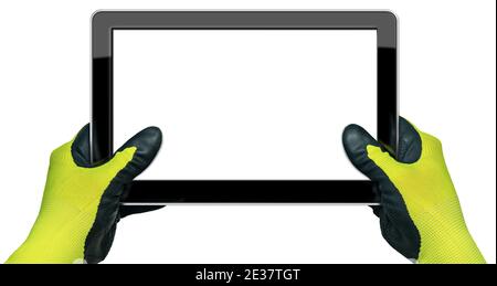 Hands with work gloves holding a blank digital tablet isolated on white background with copy space. Stock Photo
