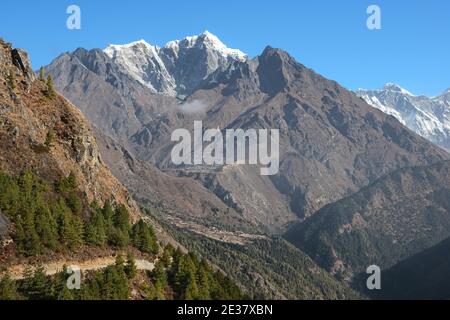 The south face of Taboche overlooking Phortse village and the entrance to the Imja Khola valley. Stock Photo