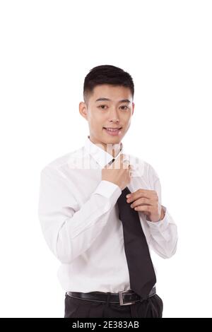 Portrait of a young bisiness man tying high quality photo Stock Photo