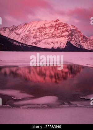 Reflection of Mountains in Upper Kananaskis Lake, Kananaskis, Alberta, Canada Stock Photo