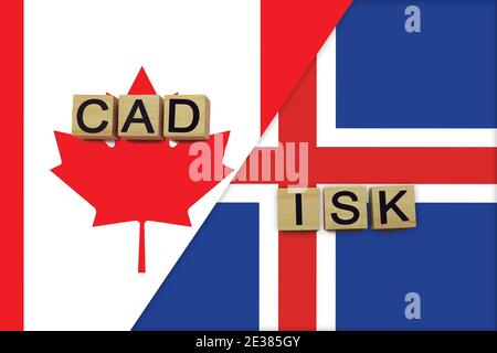 Canada and Iceland currencies codes on national flags background. International money transfer concept Stock Photo