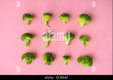 Fresh broccoli isolated on pink background Stock Photo