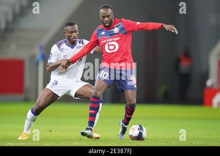 LILLE, FRANCE - JANUARY 17: Ghislain Konan of Stade Reims, Jonathan Ikone of Lille OSC during the Ligue 1 match between Lille OSC and Stade Reims at Stade Pierre Mauroy on January 17, 2021 in Lille, France (Photo by Jeroen Meuwsen/Orange Pictures/Alamy Live News)*** Local Caption *** Ghislain Konan, Jonathan Ikone