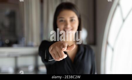 Close up Indian businesswoman hr manager pointing finger at camera Stock Photo