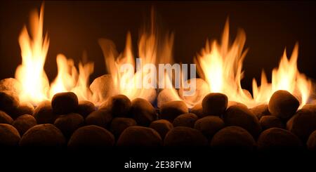 Yellow flames from a gas fire with stones in the fireplace Stock Photo