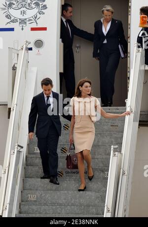 French President Nicolas Sarkozy, wife Carla Bruni-Sarkozy, Laurent Stefanini and Michele Aliot-Marie arrive at Hal Airport in Bangalore, India on December 4, 2010. French President Nicolas Sarkozy is on a four-day working visit to India and is expected to chase lucrative French-Indian trade contracts. Photo Thierry Orban/ABACAPRESS.COM Stock Photo