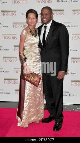 Forest Whitaker and his wife, Keisha, arrive for the formal Artist's Dinner at the United States Department of State in Washington, D.C. on Saturday, December 4, 2010. Photo By Ron Sachs/ABACAUSA.COM (Pictured: Forest Whitaker, Keisha Nash ) Stock Photo