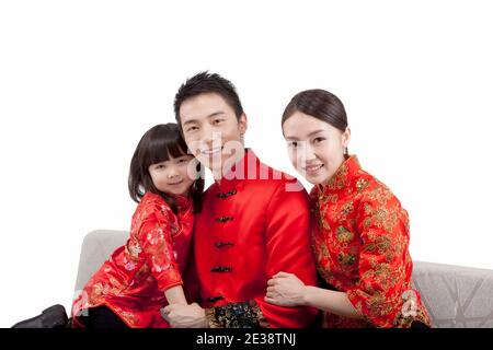 Portrait of daughter with parents in Tang suits high quality photo Stock Photo